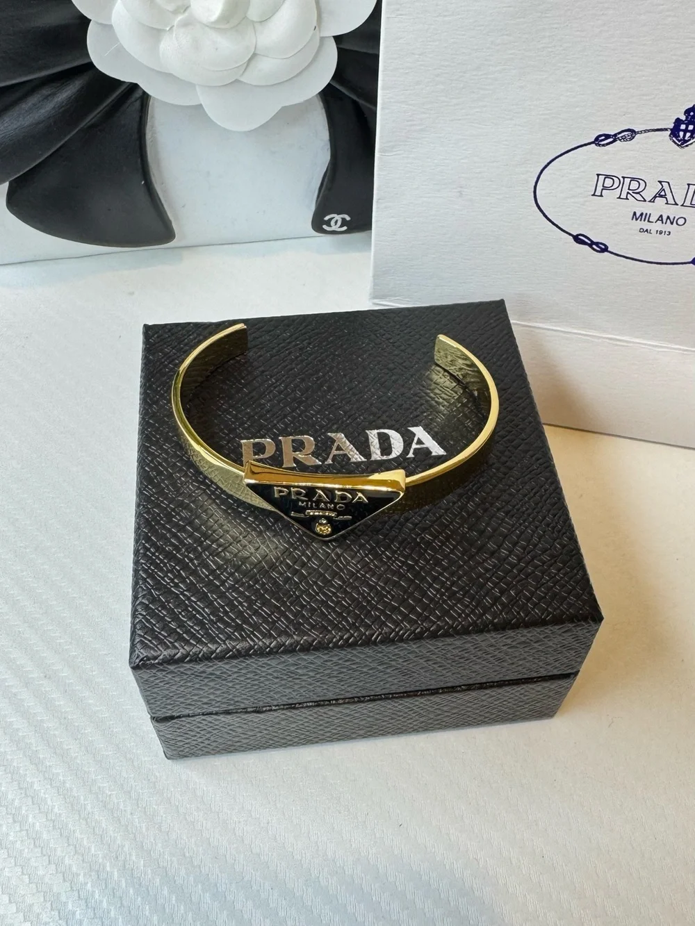 Prada polished gold